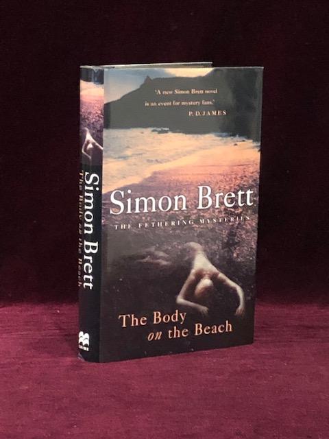 Item #09457 THE BODY ON THE BEACH. A Fethering Mystery. Simon BRETT, SIGNED.